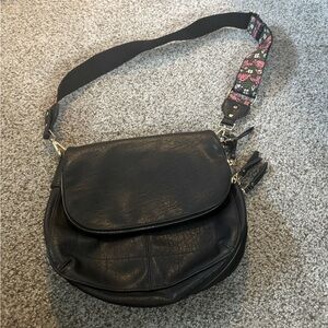 Black Shoulder bag with floral accent strap